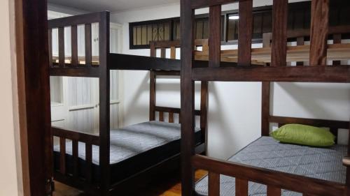 Ένα ή περισσότερα κρεβάτια σε δωμάτιο στο Casa Menus de Boquete Vista a las Montañas