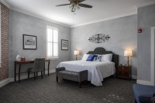 Ένα ή περισσότερα κρεβάτια σε δωμάτιο στο Hotel Audubon