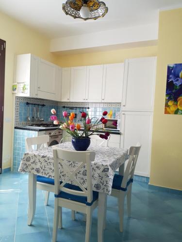 A kitchen or kitchenette at Aurora Apartments and Spa