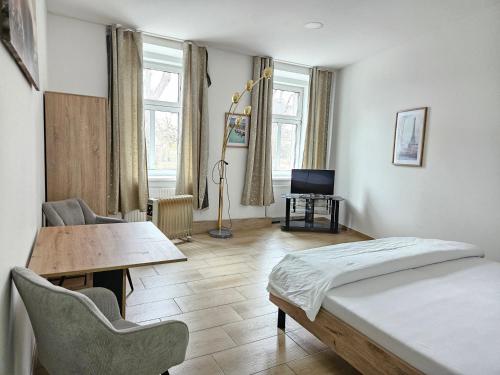 Ένα ή περισσότερα κρεβάτια σε δωμάτιο στο Schönbrunn Apartments