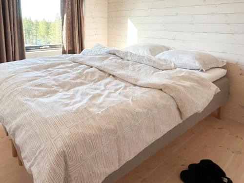 Ένα ή περισσότερα κρεβάτια σε δωμάτιο στο Architect-Designed Cabin Panoramic View