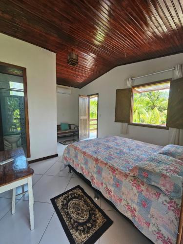 Postel nebo postele na pokoji v ubytování Aconchego do Carapitangui