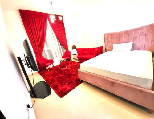 Ένα ή περισσότερα κρεβάτια σε δωμάτιο στο Ajman holiday home