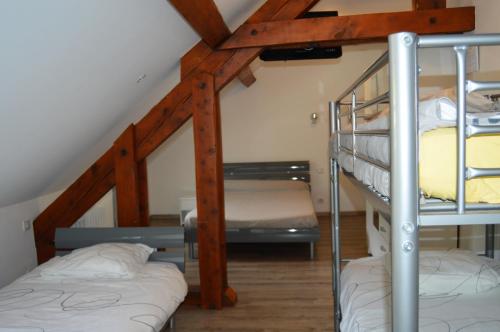 Postel nebo postele na pokoji v ubytování Hôtel Restaurant Le Bellevue