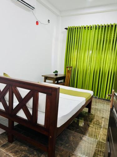 Ένα ή περισσότερα κρεβάτια σε δωμάτιο στο White House River Villa