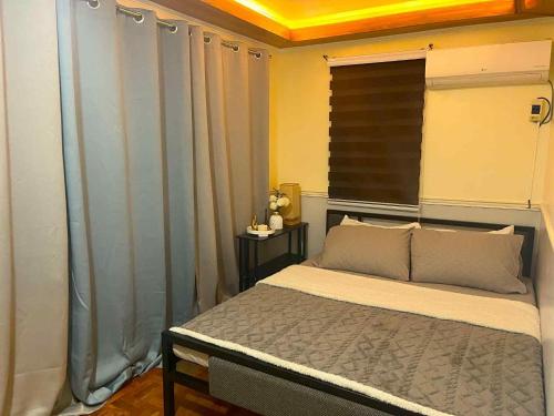 Ένα ή περισσότερα κρεβάτια σε δωμάτιο στο Balai Sais - Your Scenic Home Away from Home!