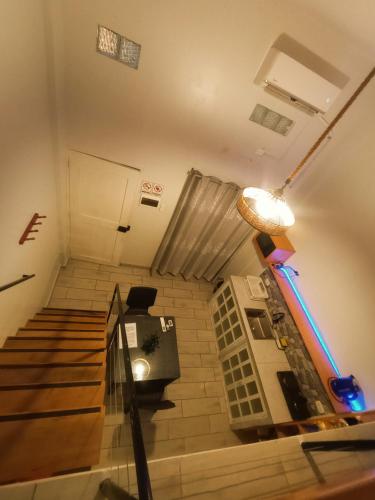 a view of a stairway with a room with at Mi Quinta Raíz Loft Apartments in Iquitos