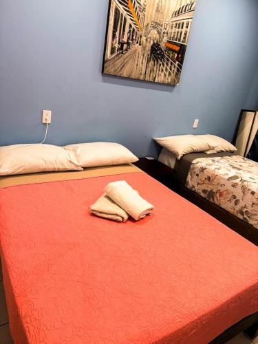 En eller flere senge i et værelse på Habitación Confortable en el Corazón de GDL