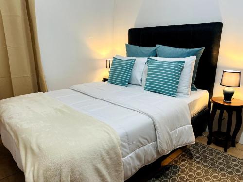 Ένα ή περισσότερα κρεβάτια σε δωμάτιο στο Alto Cruz Executive Loft