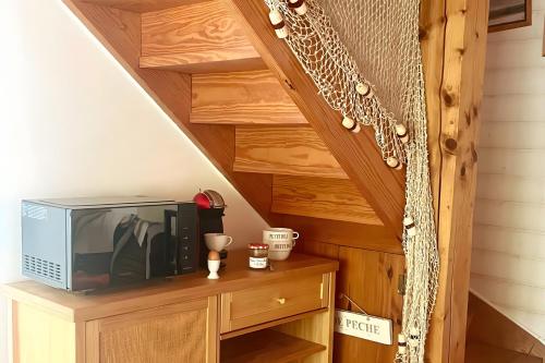 Příslušenství pro přípravu čaje a kávy v ubytování Maison de vacances à l'Océan