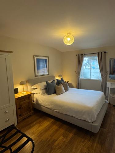 En eller flere senge i et værelse på One Abbey Court