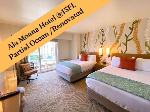 a hotel room with two beds and a window at Ala Moana Hotel 13th FL Partial Ocean View in Honolulu