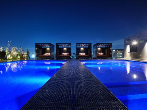 Swimmingpoolen hos eller tæt på Premium hotel MONday MAIHAMA View 1