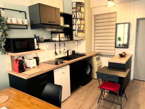 Η κουζίνα ή μικρή κουζίνα στο Appartement proche Cathédrale