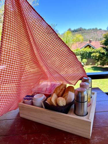 a tray of food sitting on top of a table at Terrace house in Monte Verde
