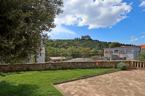 Apartments with parking space Senj - 21500