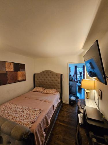 En eller flere senge i et værelse på Clientele