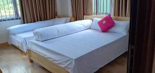 Ένα ή περισσότερα κρεβάτια σε δωμάτιο στο Kim dat hotel