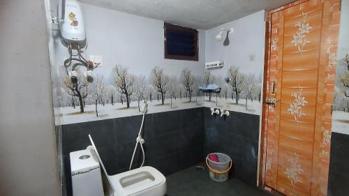 Koupelna v ubytování Pranav residency