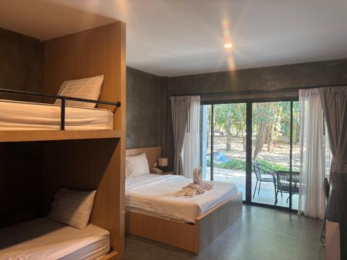 Postel nebo postele na pokoji v ubytování Blues River Resort