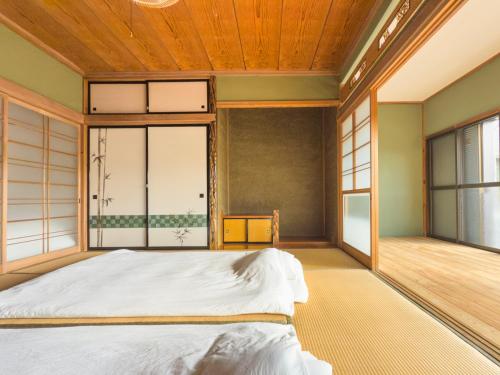 En eller flere senge i et værelse på -new-152INN