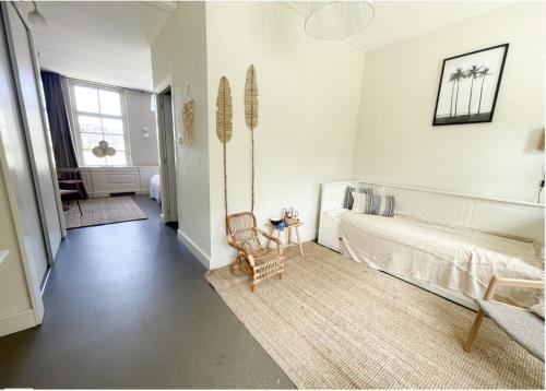 Postel nebo postele na pokoji v ubytování Newly Refreshed Family Retreat in Zoutelande