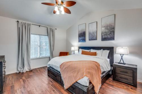 a bedroom with a bed and a ceiling fan at Stunning Home near Universal Kids Resort, Frisco in Little Elm