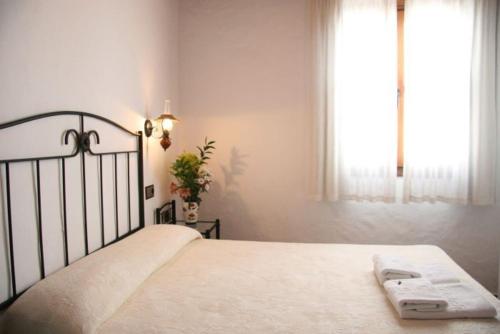 Katil atau katil-katil dalam bilik di Hostal Torre de Guzmán