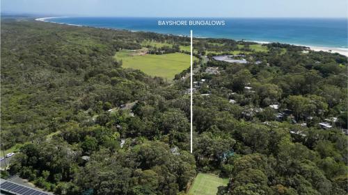 an aerial view of a park and the ocean at Bayshore Bungalow 9 - Oceanstays in Byron Bay