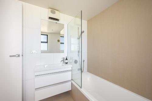 Et badeværelse på Dragonfly Cottage