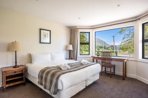 Ένα ή περισσότερα κρεβάτια σε δωμάτιο στο Pembroke Lodge