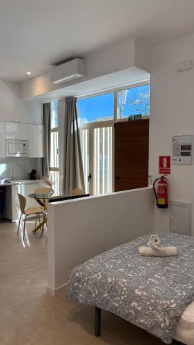 Ένα ή περισσότερα κρεβάτια σε δωμάτιο στο MAGNO- Beach