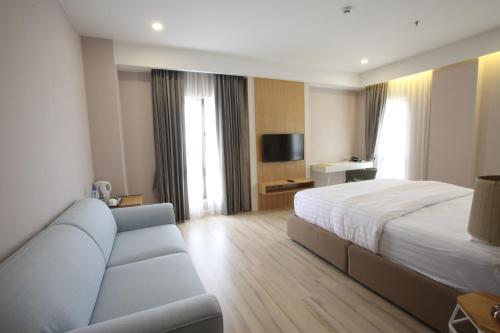 Ένα δωμάτιο στο D'Anggerek Serviced Apartment