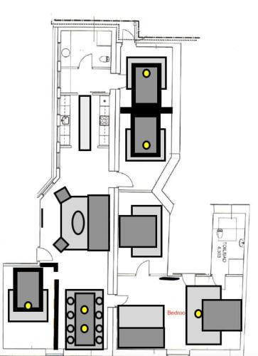 a floor plan of a house at Light-Filled 5BR Home Near Tivoli & Strøget for 12 in Copenhagen