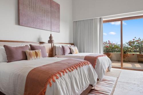 Ένα ή περισσότερα κρεβάτια σε δωμάτιο στο Beautiful PH apartment in Punta Mita, acces beach Club