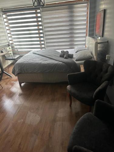 En eller flere senge i et værelse på Besiktas Guest House