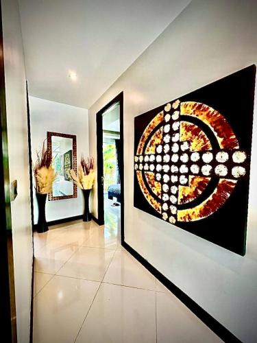 Postel nebo postele na pokoji v ubytování Pool Villa Karaoke Jomtien Pattaya