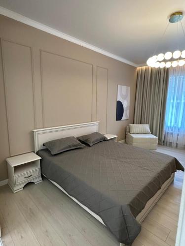 Postel nebo postele na pokoji v ubytování 4YOU Business class apartment