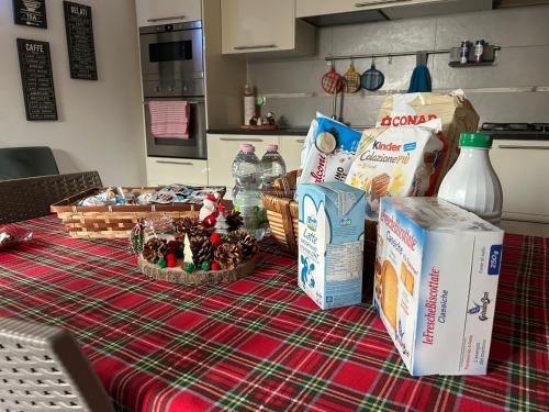 a table with christmas items on top of it at Dal Cappellaio Matto in Taranto