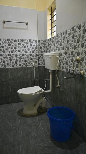 Koupelna v ubytování Sasthi Inn Hotel