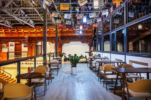 Εστιατόριο ή άλλο μέρος για φαγητό στο Namzhuo Tibetan-style Courtyard Manor