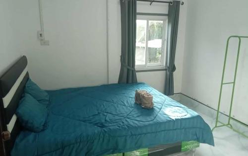 Giường trong phòng chung tại khlongnin Householder