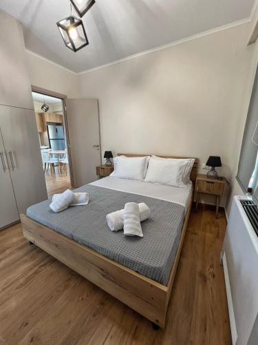 a bedroom with a bed with towels on it at Endless View 2 in Mythimna