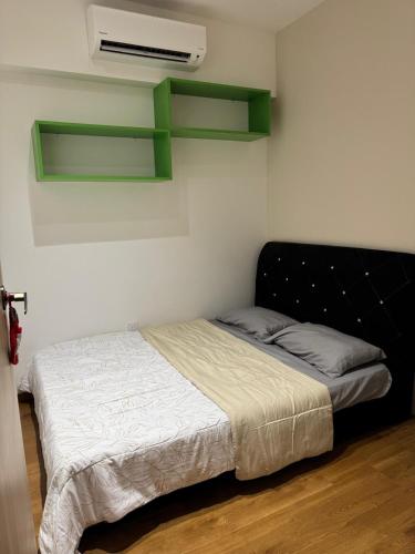 Ένα ή περισσότερα κρεβάτια σε δωμάτιο στο Make Memories Cozy 2BR Family Suite Summer Mall