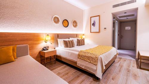 Ένα ή περισσότερα κρεβάτια σε δωμάτιο στο Sy Belek Boutique Luxury Hotel