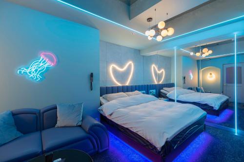 Postel nebo postele na pokoji v ubytování Design Hotel W Zip Club