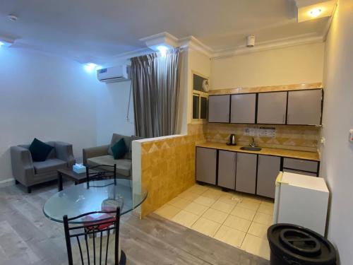 Kuchyň nebo kuchyňský kout v ubytování مريم للشقق المخدومه