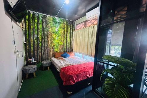 Postel nebo postele na pokoji v ubytování OYO 95057 Abe Homestay