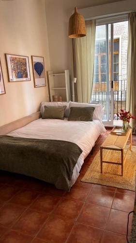 Postel nebo postele na pokoji v ubytování Estudio recién decorado en el mejor centro histórico