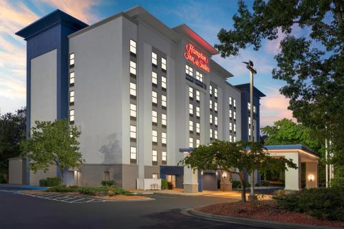 an artist rendering of a hotel exterior at Hampton Inn & Suites Charlotte Arrowood Rd in Charlotte